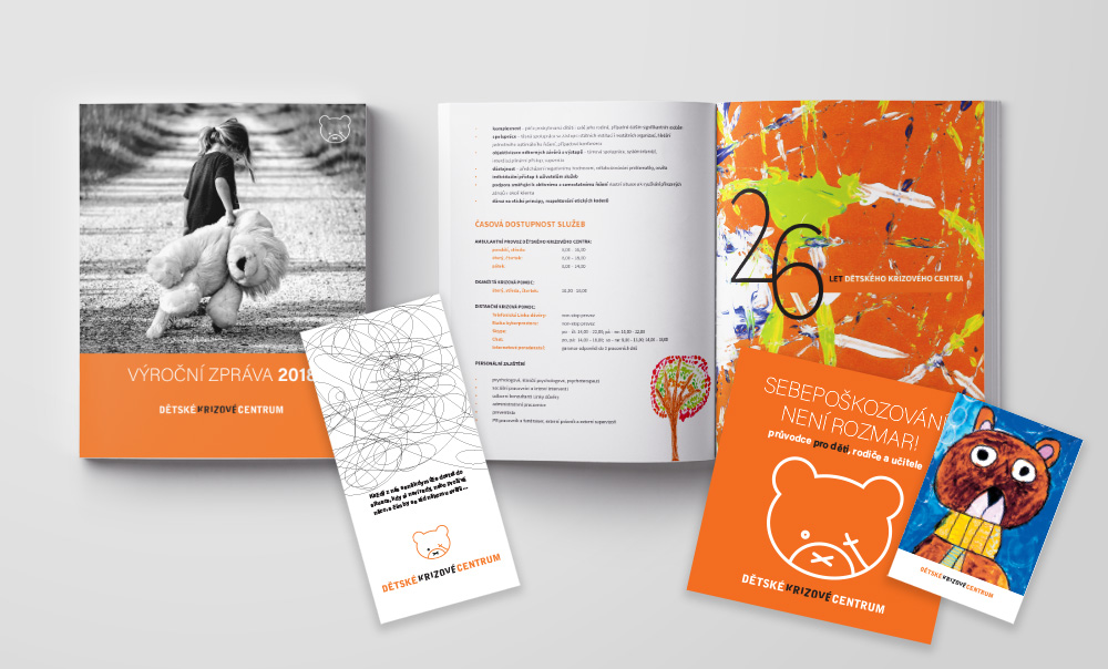 Grafické návrhy výroční zprávy, letáků a brožur neziskové organizace Dětské krizové centrum.